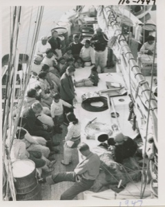 Image of Group of natives on deck from rigging